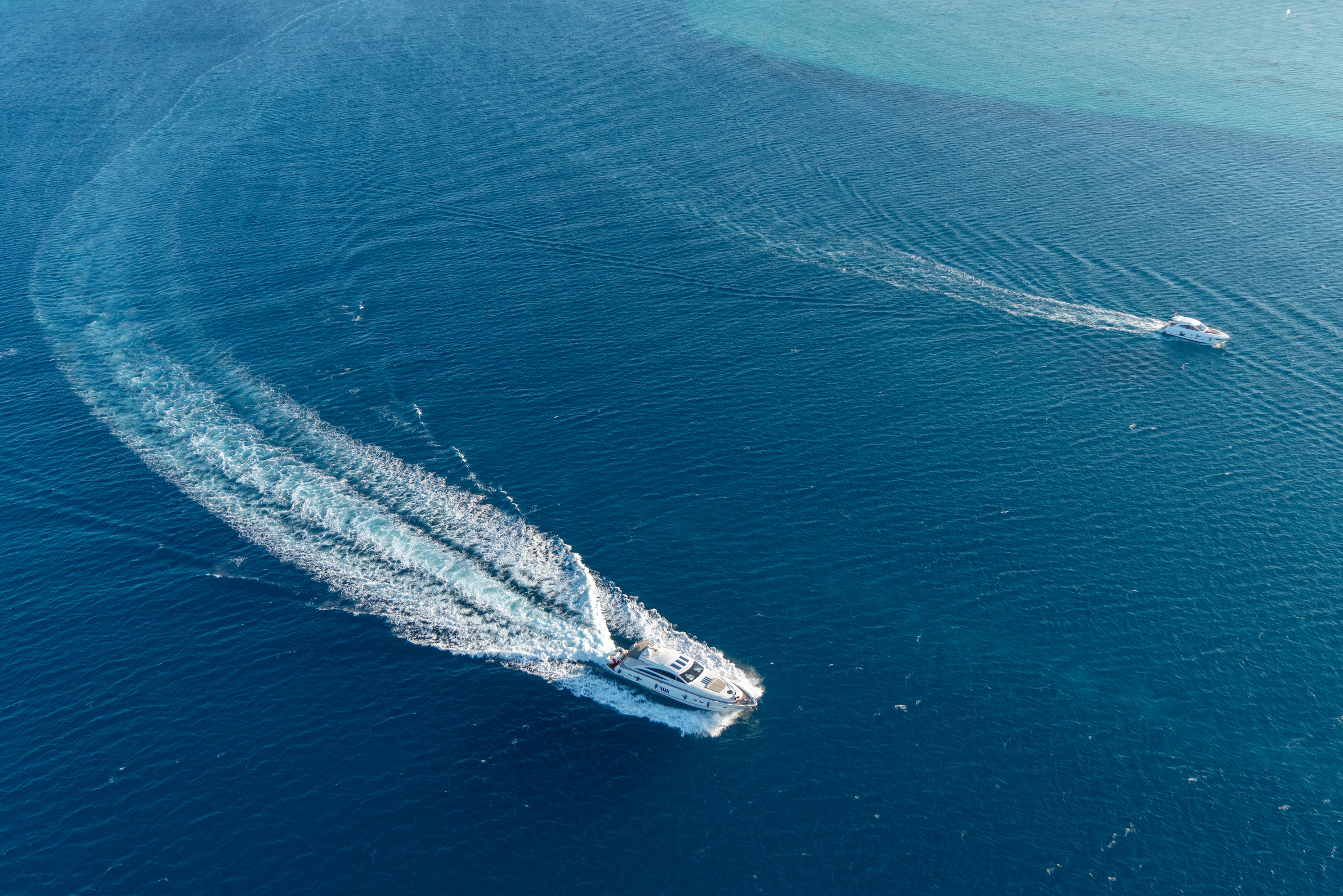 yacht and speedboat